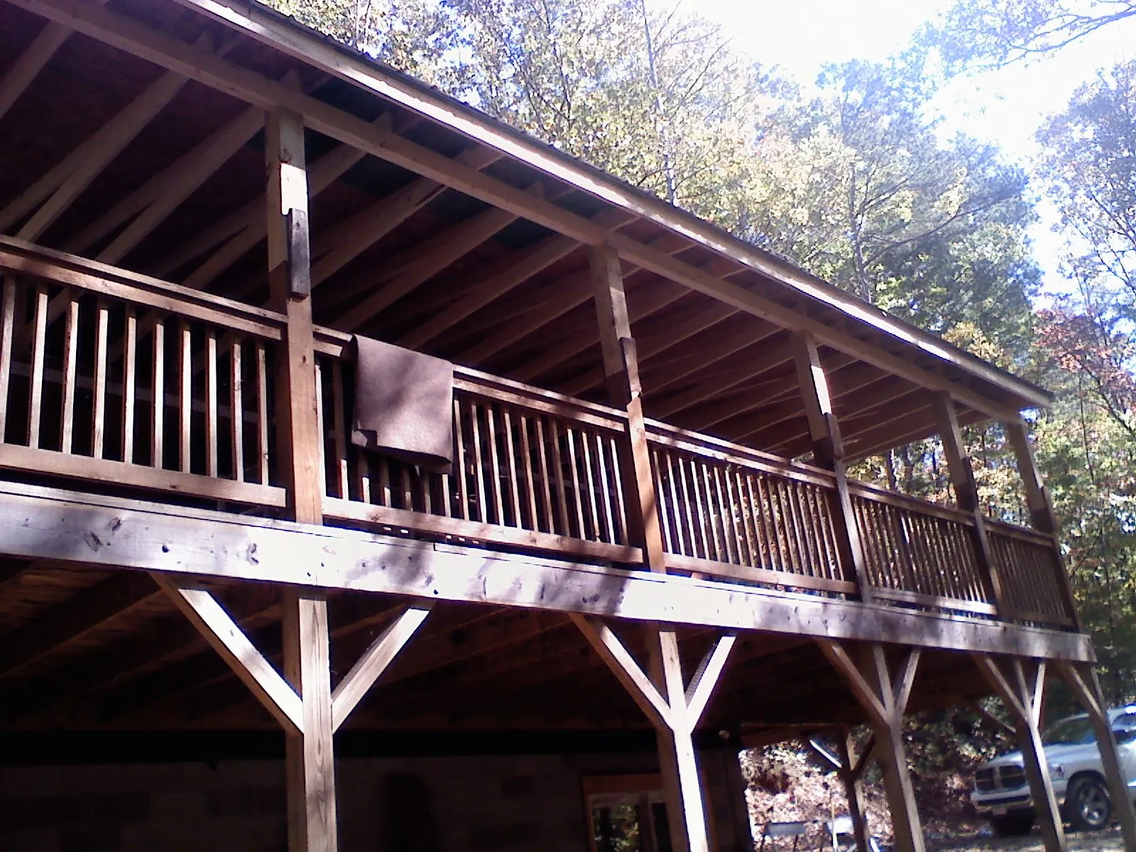 Timber framing under a new elevated porch and deck — Roof Leak Repair in Center Hill by Roofing Brothers